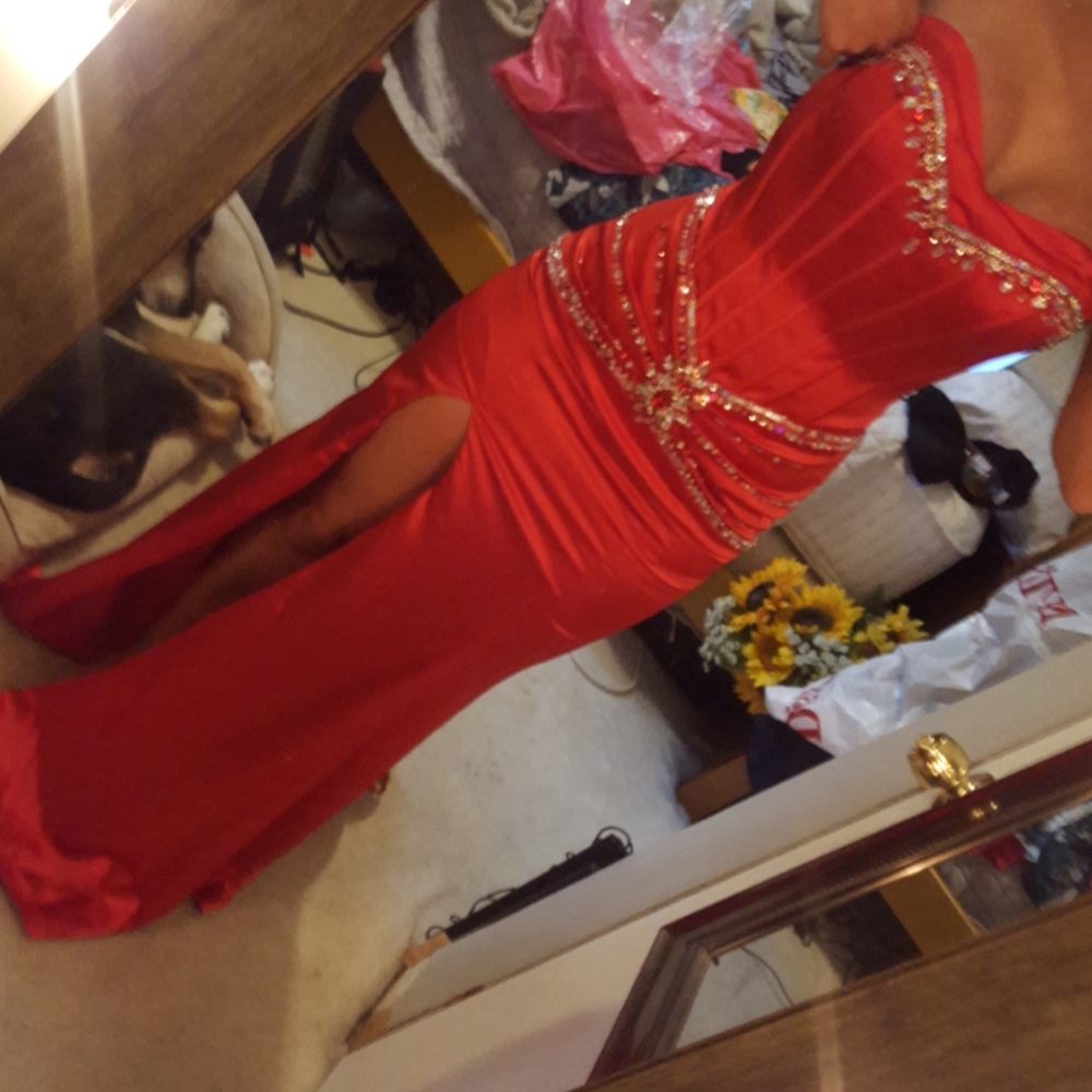 Floor length ruby red corset gown